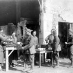 1918 – Salvation Army Girls, Gladys and Irene McIntyre, Myrtle Turkington and Stella Young, serving doughnuts and coffee to soldiers. 26th Division, Ansonville, France