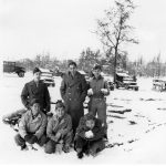 This photograph shows Yamane (crouching, center) and several soldiers at Camp Savage, Minnesota, while assigned to the Military Intelligence Service Language School (MISLS). (Yamane Family Collection)