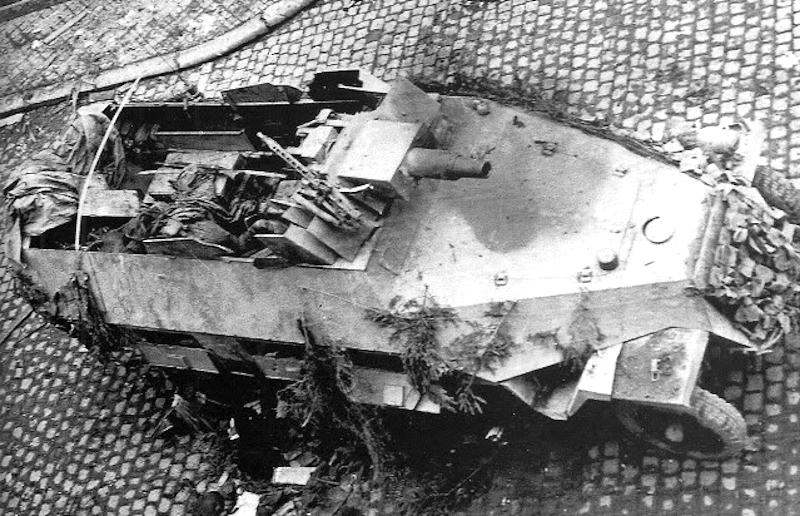 Stavelot December 1944 - SS-Obersturmführer Heinz Wägner's Sd.Kfz Ausf D. Stummel destroyed by an M-4 Sherman