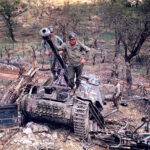 American troops looked over German armor destroyed during the drive towards Rome, 1944