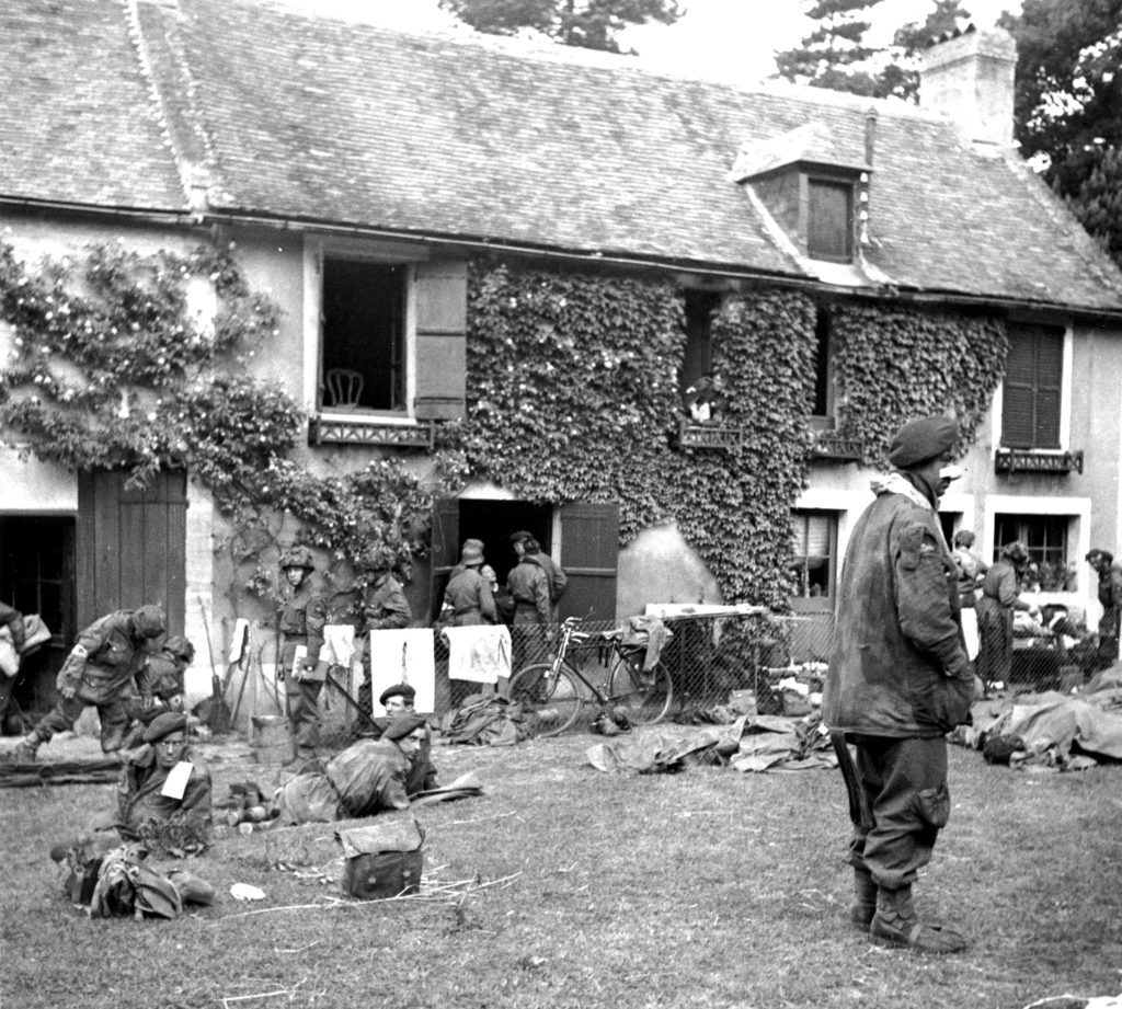 Collecting Aid Station somewhere in Normandy - Note de German Medic in the center of the photo