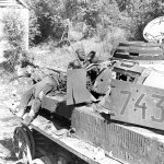 Destroyed German Panzer 4 with dead crew members – Falaise 1944