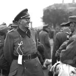 [EPINAL] A smiling Wehrmacht officer now a prisoner in an American PW camp in Epinal (France) November 28, 1944.
