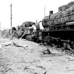 [Normandy] Destroyed railway engine and German guns at Vire railway station, Normandy, 1944