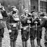 US AEF Troops being instructed how to use a gas mask