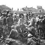 Soldiers of the U.S. 30th Infantry Division are seen with German prisoners following the capture of Bellicourt in northern France on Sept. 29, 1918