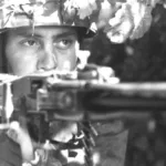 001 – German Fallschirmjäger 3.FD with an MG 42. St Lô, Normandy – July 1944 (Bundesarchiv)