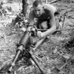 An American soldier with a captured Japanese Type 92 7.7mm machine gun