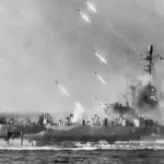 April 1945 – Rockets from an American warship stream toward Okinawa Island