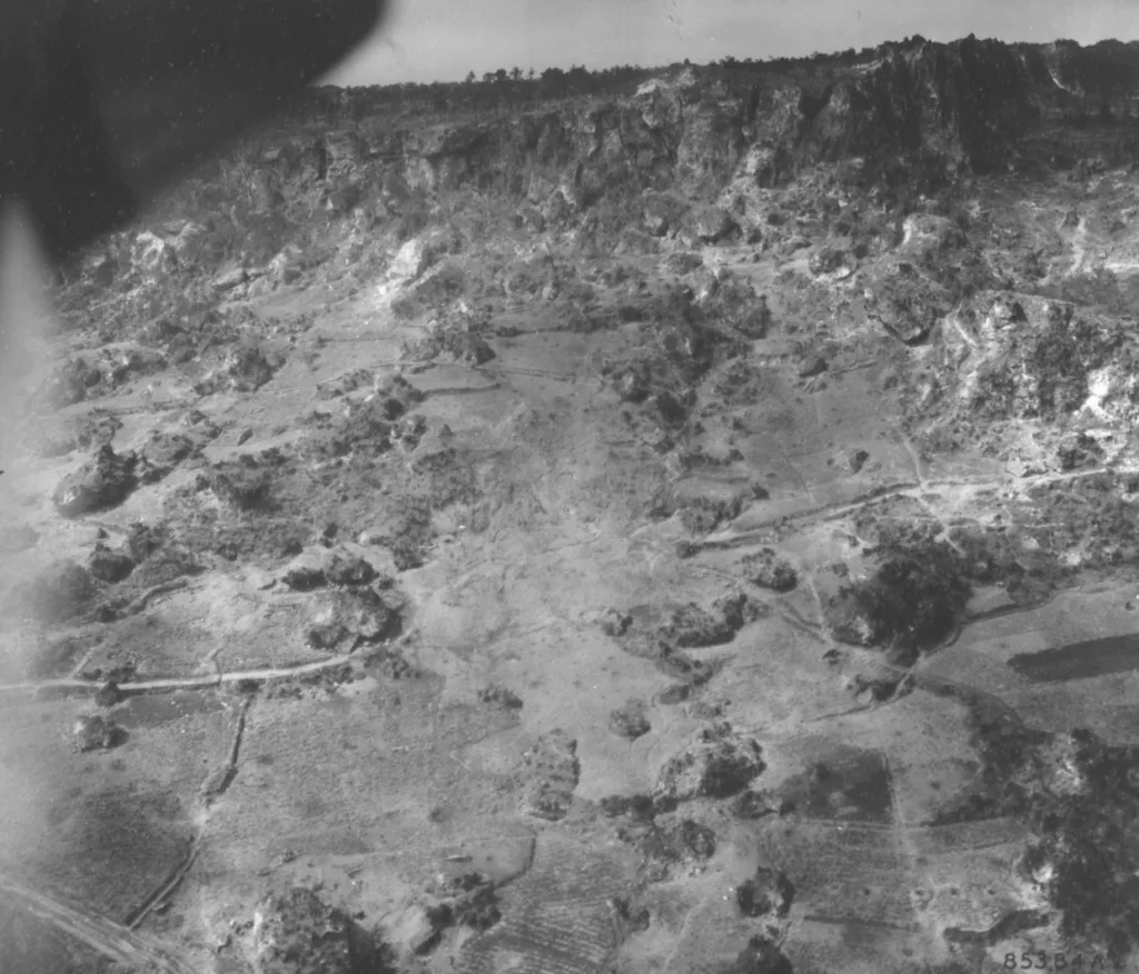Soldiers of the 382nd Infantry Regiment, 96th Infantry Division, inched up a hill against heavy Japanese resistance during the final days of the Battle of Okinawa (USAF-NARA)