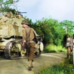 US Troops – probably Cavalry Reconnaissance Squadron passing beside at road marquer CHATEAUNEUF – France