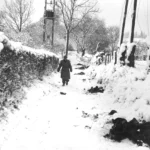 Belgium, Battle of the Bulge, January 1945, A soldier of the 82nd Airborne check the enemy deads (troop identification) after eliminating a strong point (Location Unknown)