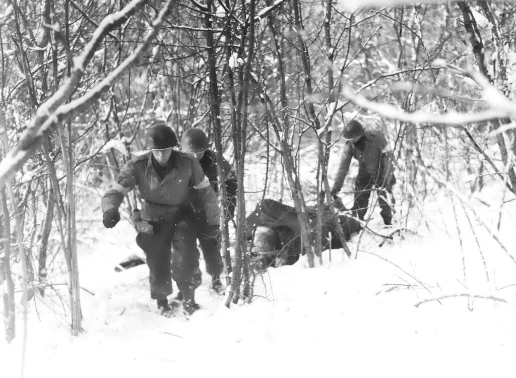 Getting aid for the wounded and getting them to the aid station was the problem during the Bulge