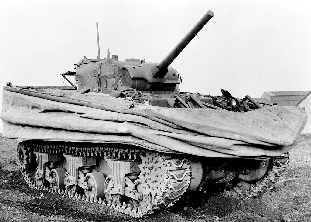 DD (Duplex Drive) tanks, also nicknamed (Donald D) tanks were a type of amphibious swimming tank developed by the British during WWII. The phrase is mostly used for the Duplex Drive variant of the M-4 Sherman medium tank, that was used by the Western Allies during and after the Normandy Landings in June 1944