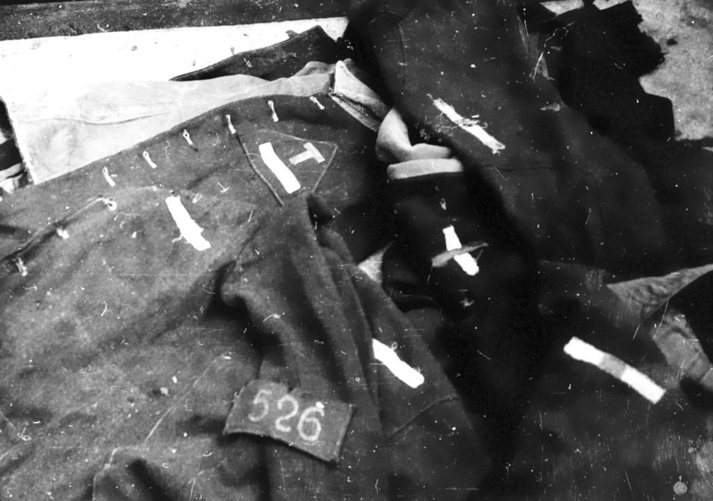 Pile of uniforms removed from executed prisoners - Breendonk
