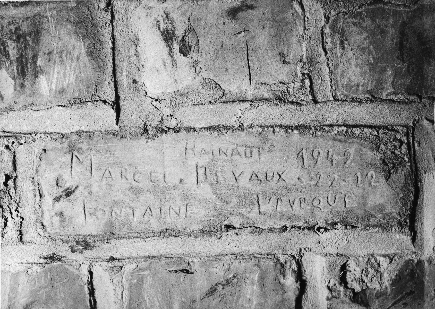 Traces engraved in the bricks from unfortunate prisoner of Breendonk Traces engraved in the bricks from unfortunate prisoner of Breendonk