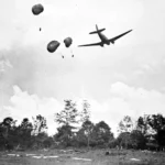 US C-47 drops supplies to Allied troops in action against Japanese forces during the fighting in Burma and India 1944