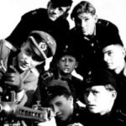 A group of Hitler youth receive instruction in the use of a machine-gun, somewhere in Germany