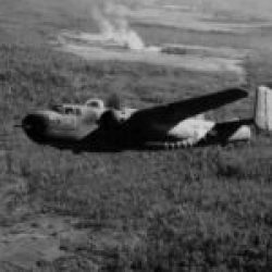 B-25-(H) Dolly (Air Commando) ending a bomb run over a Japanese airfield in Burma