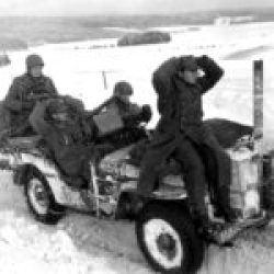 Captured Krauts being sent to the rear – January 1945