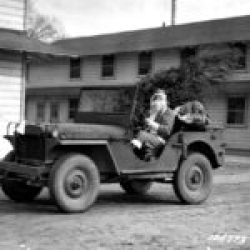 Christmass – US-Army-soldier-dressed-as-Santa-Claus-at-Camp-Lee-Virginia-United-States-12.1941