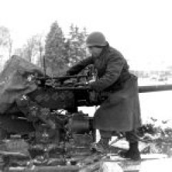 Scaled-December 1944, Pvt Paul Romanick maning a 40-MM AAA AW B Btry, 103th AAA BN Sourbrodt (town)