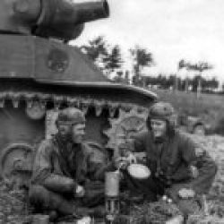 Task-Force-Stroke-2019-007-113th_Cav_Recon_Troopers_brew_chow_next_to_M8_Holland_sep44-1024×1508