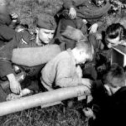 Training October 10 1944. Replacement troops of the brigade Grossdeutschland take a short rest. Inquisitive village children take the opportunity to study everything very carefully (Panzerschreck)