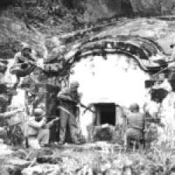 U.S. Marines clearing a traditional burial tomb during the Battle of Okinawa, May 1945.
